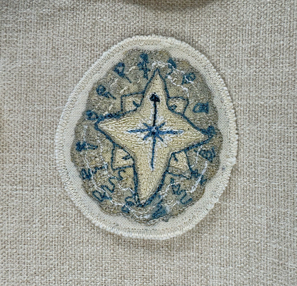 Selkie “Searching - Compass Shell” Talisman – Free Motion Embroidered Patch / Bag Charm - Iron-on Patch image