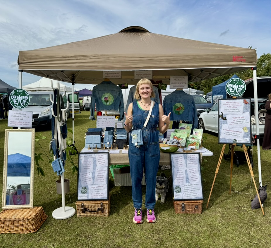 Lucy in front of her Wild Minder craft stall