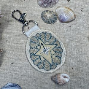 Selkie “Searching - Compass Shell” Talisman – Free Motion Embroidered Patch / Bag Charm