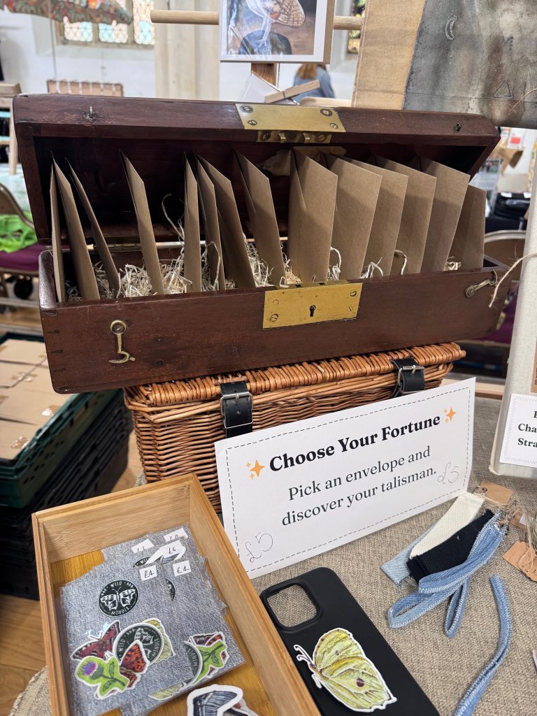A photo of the "Choose your fortune" box found on Wild Minder markets stall