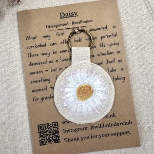 A photo of Daisy Talisman Keyring