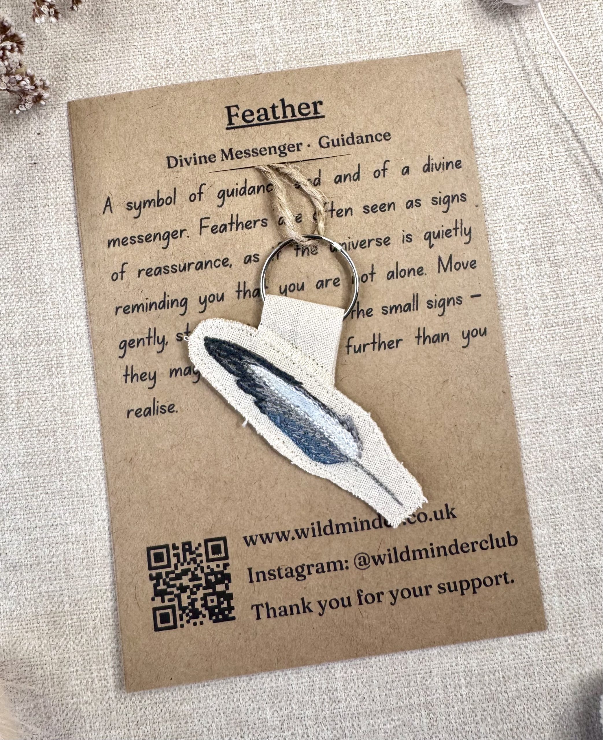 A photo of Feather Talisman Keyring